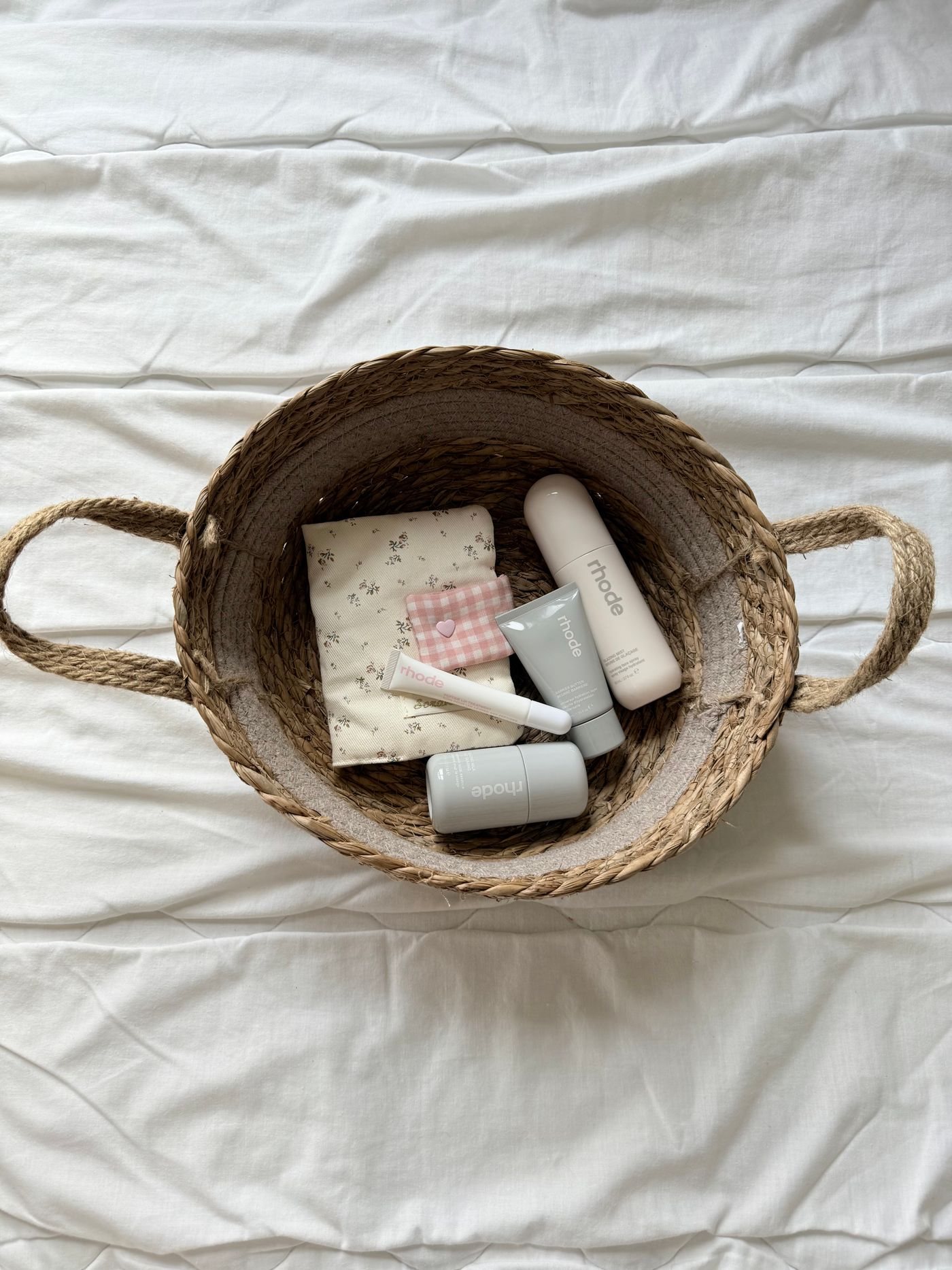 A basket of baby care items and cloth