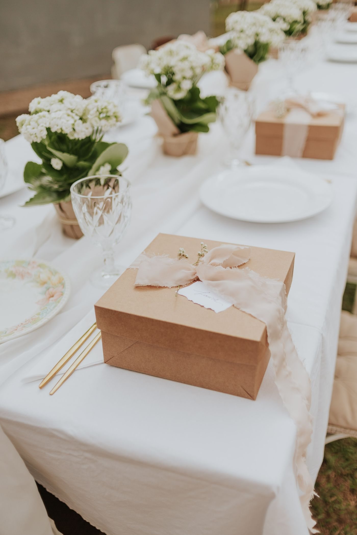 Gift boxes and flowers on an elegant wedding table
