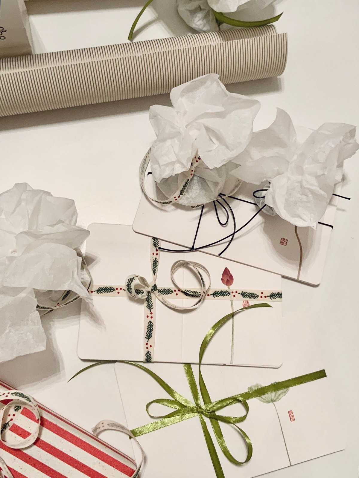 Gift boxes and wrapping materials with ribbon